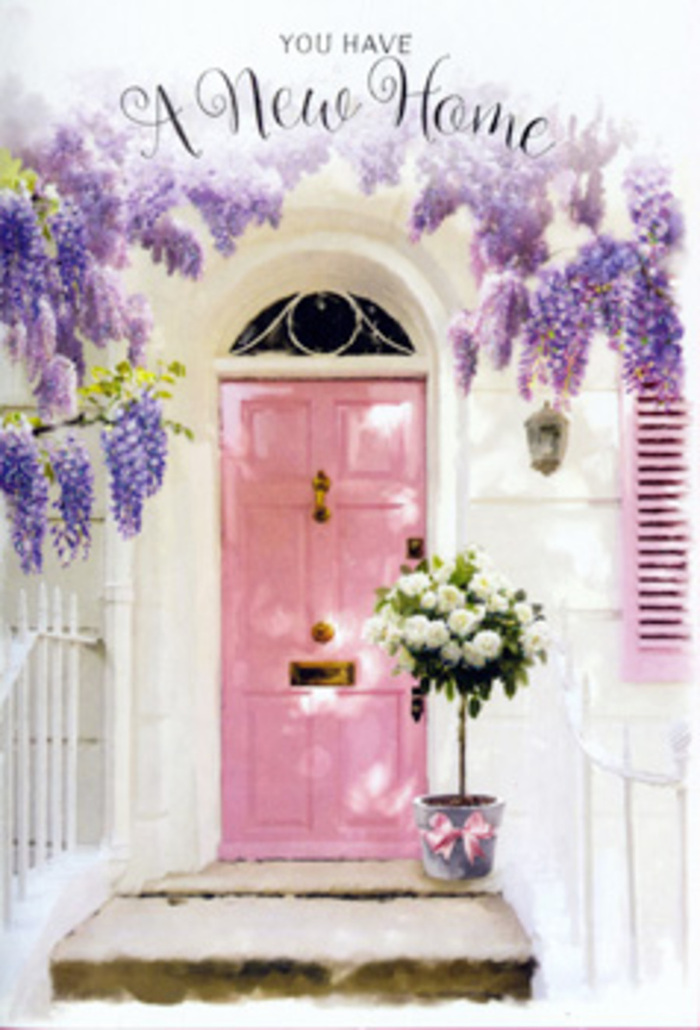 This image portrays a quietly enchanting entrance, the kind of scene you might stumble upon wandering through the residential avenues of Chadwell Heath on a bright spring afternoon. A blush-pink front door stands at the centre, its paint smooth and slightly reflective, catching the light and sending back a gentle, rosy glow. The surrounding walls are whitewashed, clean and calm, allowing the colour of the door and the flowers to truly sing. From above, abundant wisteria cascades in layers of soft lavender and lilac, the racemes hanging like delicate chandeliers, suggesting that light, nostalgic fragrance so often associated with English gardens. The vine clings and curves around the frame of the door and a small shutter, adding a sense of age and character, as though this home has quietly blossomed alongside its owners. At the threshold sits a simple, stylish tin bucket in muted grey, placed carefully on the step and brimming with white and cream roses. Each rose head is full and plush, some just opening, others already unfurled, their petals gently cupped as though holding tiny pools of light. Sprigs of fresh green foliage peek between the roses, giving the arrangement texture and a sense of movement, like a gentle breeze could ruffle it at any moment. A satin pink ribbon encircles the bucket, tied in a loose bow that mirrors the pink door and pulls the whole palette together. Soft, dappled light creates gentle shadows on the stone steps, and the scene feels like a blessing for someone moving into their new place near local Chadwell Heath shops, ideal for a card or flower delivery that celebrates home, hope, and the start of many cherished memories.